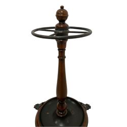 Theodore Alexander - Victorian design mahogany umbrella or stick stand, turned pedestal with four division stick restraint, circular base with inset dished drip tray, on three acanthus leaf decorated claw feet
Provenance: From the Estate of the late Dowager Lady St Oswald