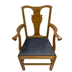 Oak carver chair by Shakleton of Snainton, the shaped cresting rail and splat, with scrolled arms over seat upholstered in blue fabric raised on squared supports, together with coffee table