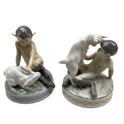 Two Royal Copenhagen figures 'Faun with Goat' no. 498 and 'Faun with Rabbit' no. 439, both designed by Christian Thomsen, H13cm max (2)