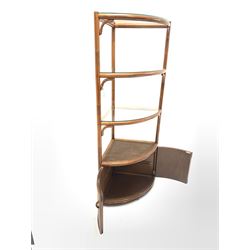 Mid 20th century bamboo bow front corner etagere, with three inset glass shelves over two rattan doors to base (H161cm) together with two figural greeting card holders (H96cm)