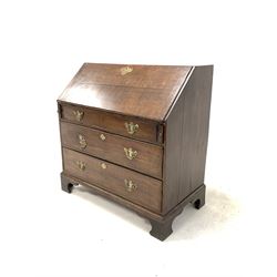 19th century oak bureau, the cross banded fall front revealing interior fitted with drawers and cubby holes, over three long graduating drawers, raised on shaped bracket feet, W97cm, H101cm, D52cm
