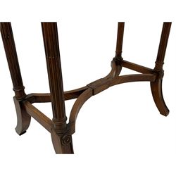 Yew wood nest of tables, the largest of rectangular form with matched figured veneer, on turned and stop fluted supports joined by plain stretchers and with splayed moulded feet, two smaller nesting tables with  curved x-framed stretchers 