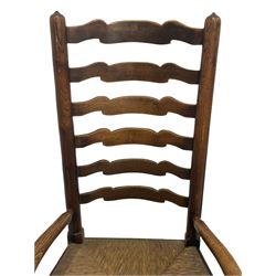 19th century country elm rocking chair, ladder back over rush seat, turned supports