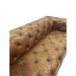 Three seat club sofa, upholstered in deeply button tan brown leather