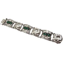 Georg Jensen silver dove link bracelet, the alternating foliate design links each set with three cabochon green agates, model No. 32