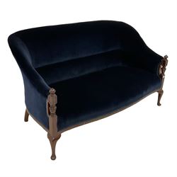 Early 20th century mahogany settee, upholstered in deep indigo velvet with sprung seat, raised on turned supports with cabriole feet