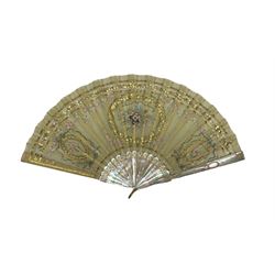 19th century Mother-of-Pearl and silk fan, the central reserve painted with a basket of flowers, flanked by two smaller reserves painted with a floral wreath and a quiver of arrows, embroidered with gold sequins and spangles, the mother-of-pearl sticks and guard with gilt pique inlay (guard L24cm)