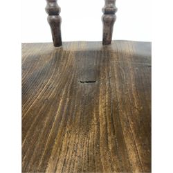 Victorian elm and ash smokers bow armchair, arm rests raised on spindle gallery over shaped saddle seat, raised on turned supports with double 'H' stretcher W68cm
