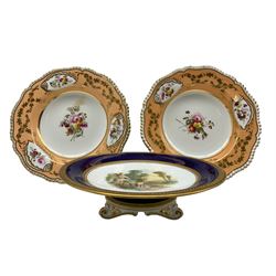 Grainger & Co porcleain comport, with central hand painted rural scene with a family stood before a cottage, pattern no, 2490 D23.5cm, together with a pair of 19th century porcelain bowls, hand painted with floral sprays within gilt shell reserves on peach ground, possibly by Henry & Richard Daniel D26cm (3)