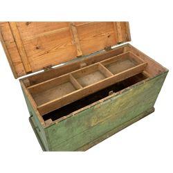 19th century green painted pine tool chest. the hinged lid enclosing tray with compartments, fitted with wrought metal carrying handles, on plinth base