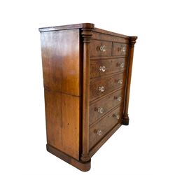 19th century mahogany chest of drawers, fitted with two short and four long drawers, flanked by two turned columns, raised on a plinth base 