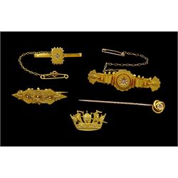 Victorian and later brooches including two 15ct gold, one diamond set, 9ct gold Etruscan rival diamond brooch, 9ct gold navel crown brooch and a gold diamond stick pin