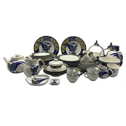 Royal Copenhagen Blue Pheasant pattern dinner and tea service for six, created after the original paintings by C. Joachim, comprising a teapot, six cups & saucers, five tea plates, sucrier, milk jug, six breakfast bowls, six dinner plates, six chargers, jug, pair of fruit baskets and four various shaped dishes 