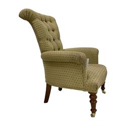 Pair Victorian design armchairs, scrolled back and arms, upholstered in buttoned spotted fabric, raised on turned front supports with brass cups and castors