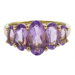 9ct gold five stone graduating oval amethyst ring, hallmarked 
