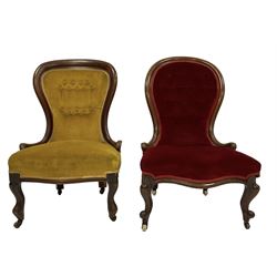 Two Victorian mahogany nursing chairs, upholstered in buttoned fabric with sprung seat, raised on cabriole supports with ceramic castors 