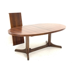 Mid 20th century hardwood veneer extending dining table, the oval top raised on two turned pedestals and splayed supports, with one additional leaf, H72cm, 110cm x 200 - 246cm (extended)
