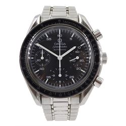Omega Speedmaster automatic chronograph wristwatch, ref 35105000, watch No. 59128763, cal. 3220, on original strap, boxed with warranty card dated 2005