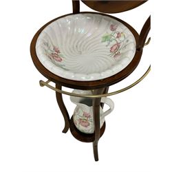 Georgian design shaving washstand, circular swing mirror over bowl rests with brass towel rail, waived supports united by undertier, with ceramic bowls and jug
