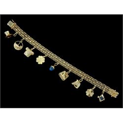 Swiss 18ct gold charm bracelet by Brofod Aktiebolaget, the fancy link bracelet suspending nine various charms, including a moonstone set cross, and a blue gem set drop, date code 1979
