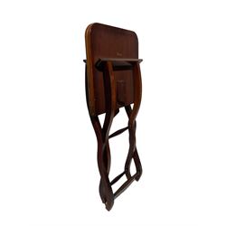 Late 19th century mahogany coaching table, raised on a folding X frame