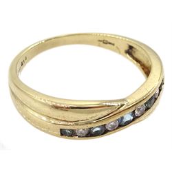 9ct gold channel set round blue topaz and diamond crossover ring, hallmarked