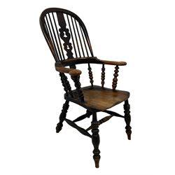 19th century elm and ash Yorkshire Windsor armchair, raised hoop and stick back with pierced splat, the arms supported by turned spindles, dished seat on turned supports joined by double H-stretchers