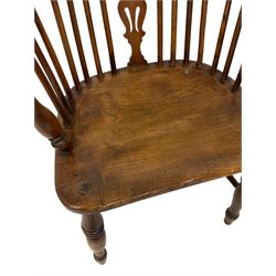 19th century elm and yew wood Windsor elbow chair, the low splat and spindle back over seat, raised on turned supports, united by stretchers 