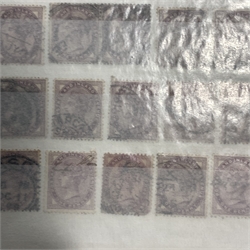 Queen Victoria and later Great British stamps in two albums including 1840 penny black with red MX cancel and 1840 two penny blue with black MX cancel, various other Queen Victoria stamps with values up to ten shillings, approximately ninety perf penny reds, various Queen Elizabeth II stamps etc