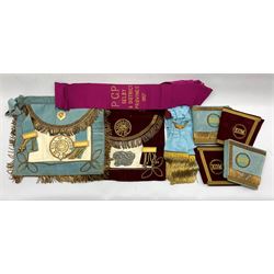 Four RAOB silver gilt and enamel breast jewels 1907-33, silk and velvet aprons, cuffs, various base metal jewels, sash etc 