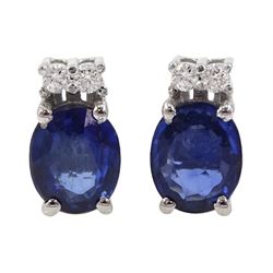 Pair of 18ct white gold sapphire and diamond pendant stud earrings, total sapphire weight approx 0.85 carat