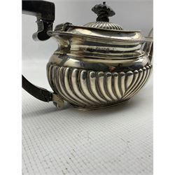 Late Victorian silver teapot with gadrooned edge, ebonised handle and lift Chester 1899 Maker Minshull and Latimer 12.1oz gross