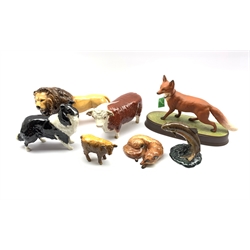 Six Beswick models comprising: Trout 1390, Lion 2554b, Hereford Bull 1363a first version, Curled Fox 1007, Sheepdog 1792 and Highland Calf 1827d, together with a John Beswick fox