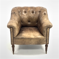  George Smith leather club chair, upholstered in deep buttoned leather, raised on turned walnut front supports and brass castors, W84cm  
