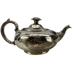 Victorian silver teapot of compressed circular form, floral lift and loop handle London 1862 Maker William Hunter