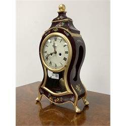 Rococo style eight day mantle clock of cartouche form, with gilt decoration and hand painted floral decoration, white enamel dial inscribed 'Hoelher' with Roman numerals striking on two bells 