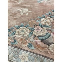 Large Chinese rug woollen rug, with pale pink field with foliate design all over 275cm x 400cm