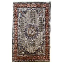 Persian Mood ivory ground carpet, the crimson and indigo floral medallion within a Herati decorated field, the multi-band border with repeating stylised plant motifs