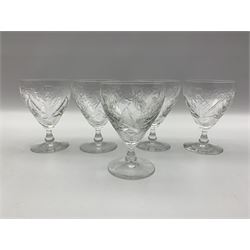 Five Edinburgh crystal wine glasses cut with flowers and thistles 