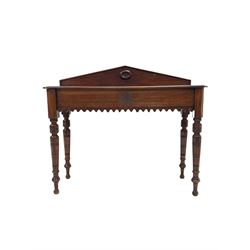 Victorian mahogany hall table, the arched raised back with floral roundel over rectangular top with moulded edge and canted corners, drawer to one end, shaped apron, raised on ring turned and tapering supports W105cm