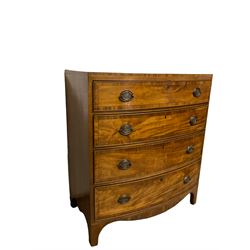 George III mahogany bow front chest of drawers, fitted with four crossbanded and graduated drawers, raised on bracket supports
