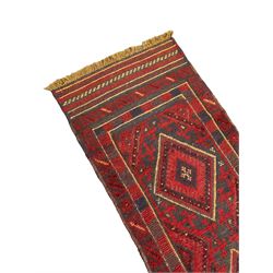 Meshwani red and blue ground runner, decorated with four lozenges within geometric bandings