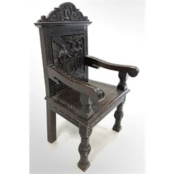 17th century design oak wainscot chair, the cresting rail carved with acanthus leaves centred by cartouche, over panelled back with further carving depicting scene from 'The Merchant of Venice' raised on octagonal and block front supports 