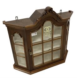 Mahogany display cabinet, with one glazed door opening to reveal two fixed shelves, with later inscription 'Chanel No 5'
