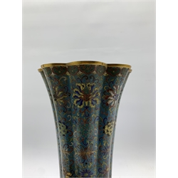 Chinese cloisonné vase, 18th Century, of lobed circular form, decorated with an all over floral design on a turquoise ground beneath a flared rim and with gilt bronze key pattern supports and gilded interior H30cm adapted for use as a table lamp and on a later marble base 