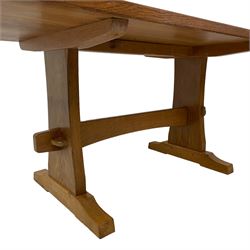 Beaverman - oak dining table, rectangular adzed oak top on shaped end supports with sledge feet, carved with beaver signature, joined by pegged stretcher, by Colin Almack, Sutton-under-Whitestone Cliffe, Thirsk