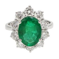 18ct white gold oval emerald and diamond cluster ring, stamped 750, emerald approx 2.85 carat, total diamond weight approx 1.60 carat
