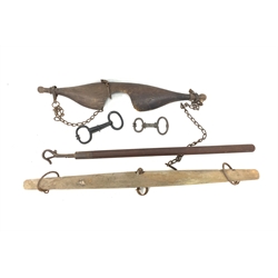 19th century bull leading pole, vintage oak yoke, two wrought iron bull nose rings, together with a wooden yoke (5)