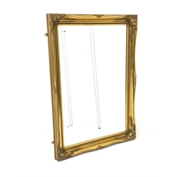 Rectangular gilt framed wall mirror with bevelled plate 