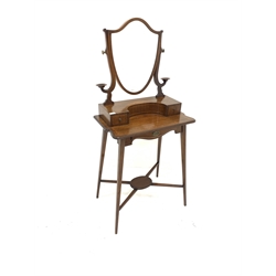 Edwardian inlaid mahogany dressing table, shield form angle poised mirror over three drawers, raised on square tapered supports united by under tier, W68cm
